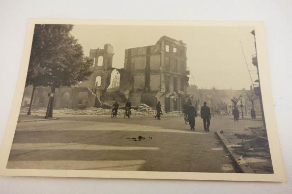 a postcard of rotterdam after the bombing