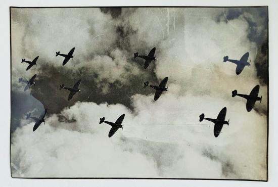 a british ww2 press picture with some spitfires