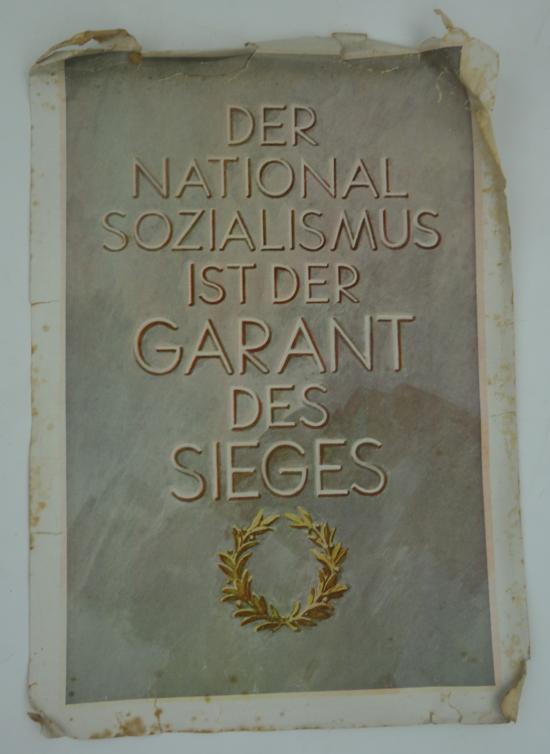 a german ww2 poster “The National Socialist is the Guarantor of Victory”