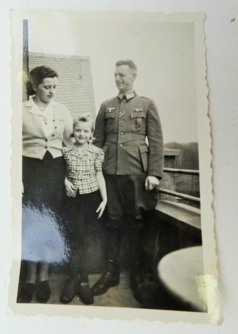 a German ww2 picture  of a German soldier and a woman