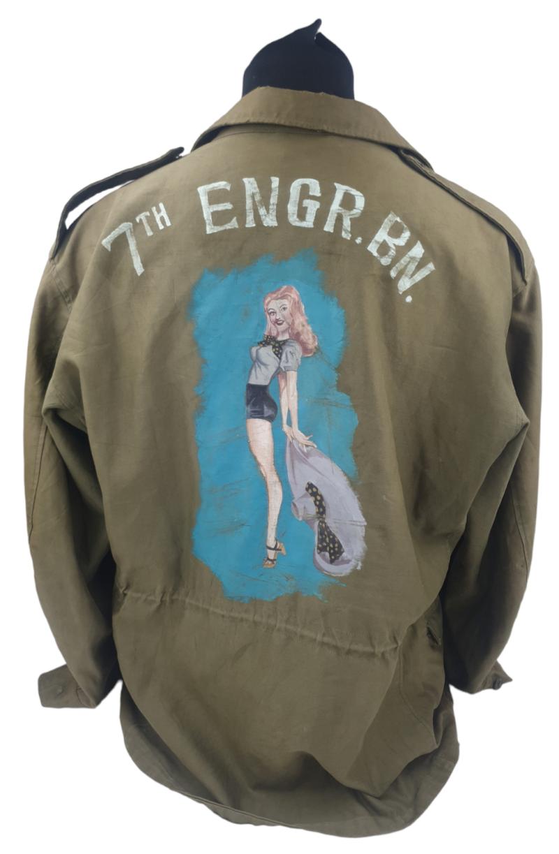 A us ww2 m43 field jacket with a drawing of 7th Engineer Battalion