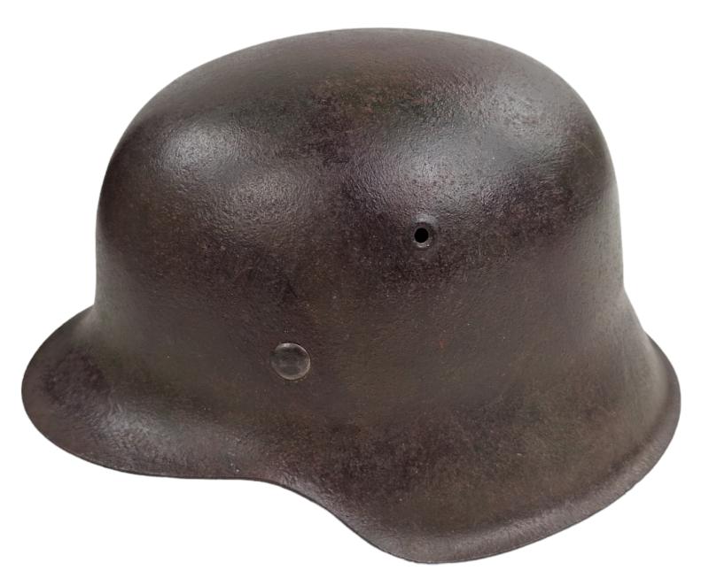 a wehrmacht m42  camouflage helmet