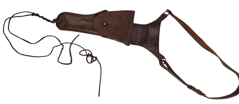 a US WW2 cold holster with shoulder strap