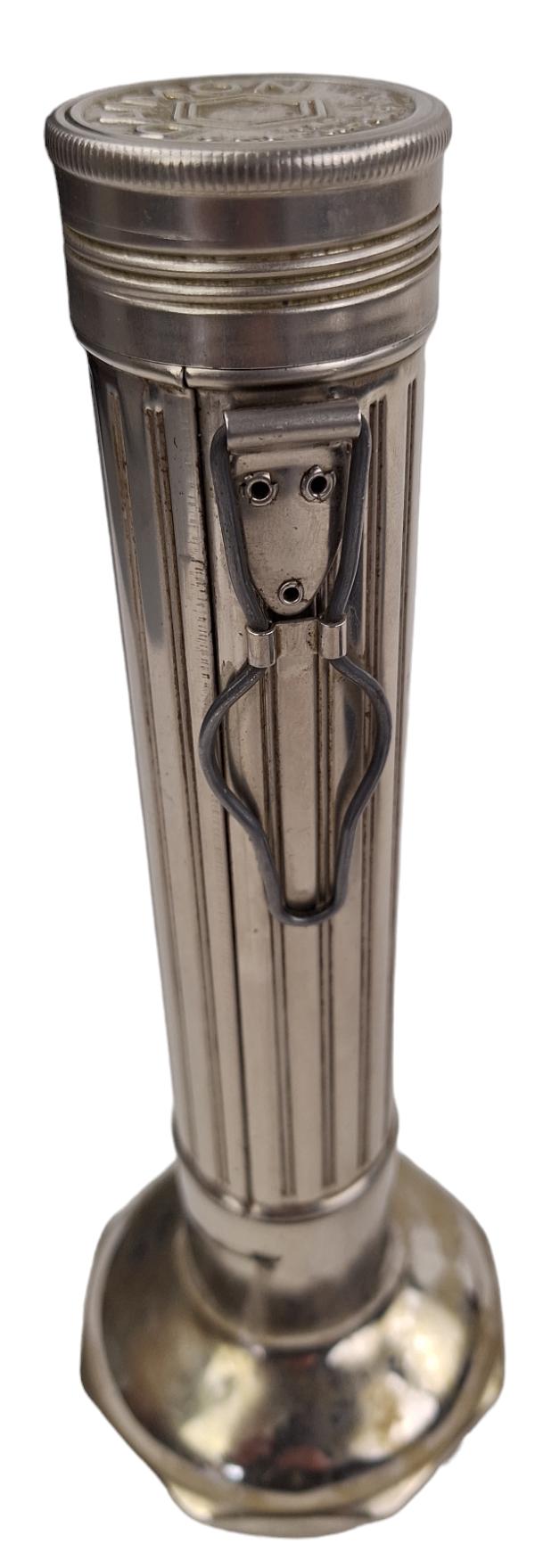a postwar daimon flashlight