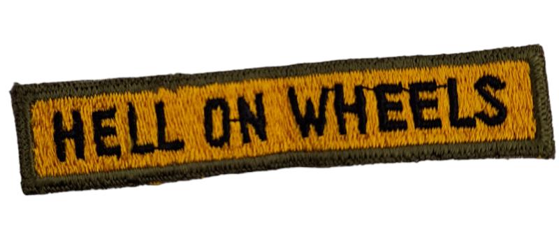 an Us 2th Armored Division patch 