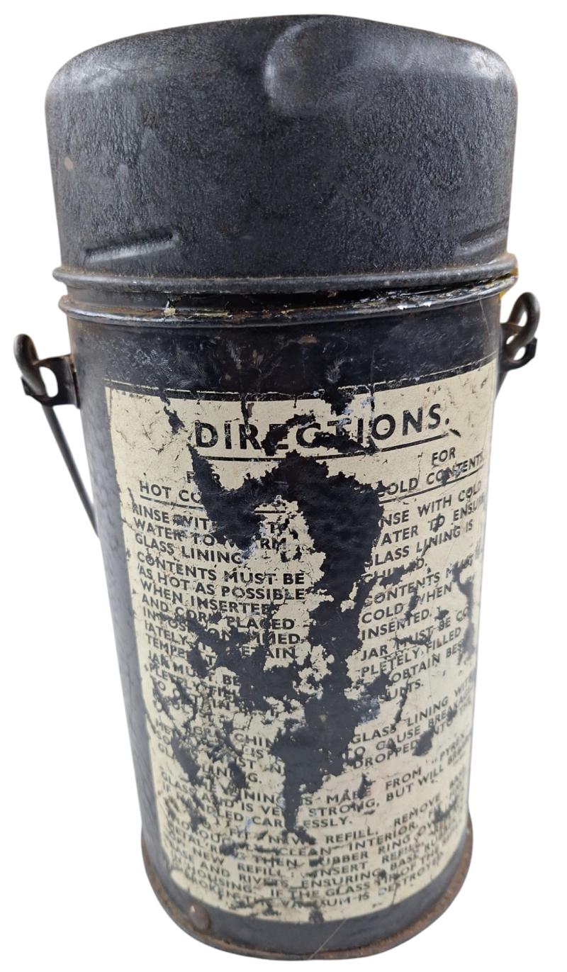 a british ww2 thermos can with date 44