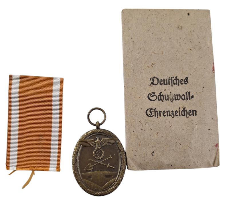 a german west walle medal in a original pouch
