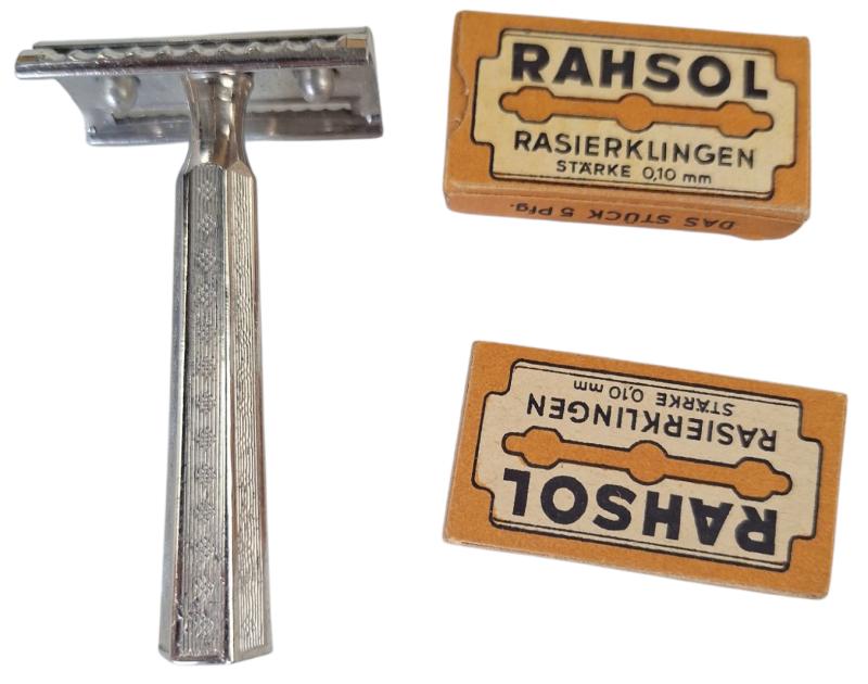 a german rasor with 2 packages off blades