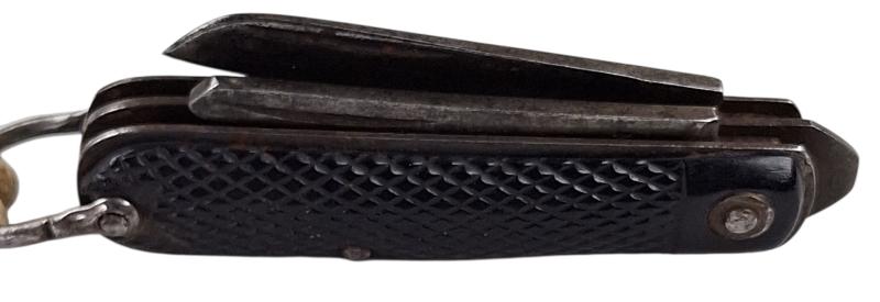 A british ww2 pocket knife with its original string