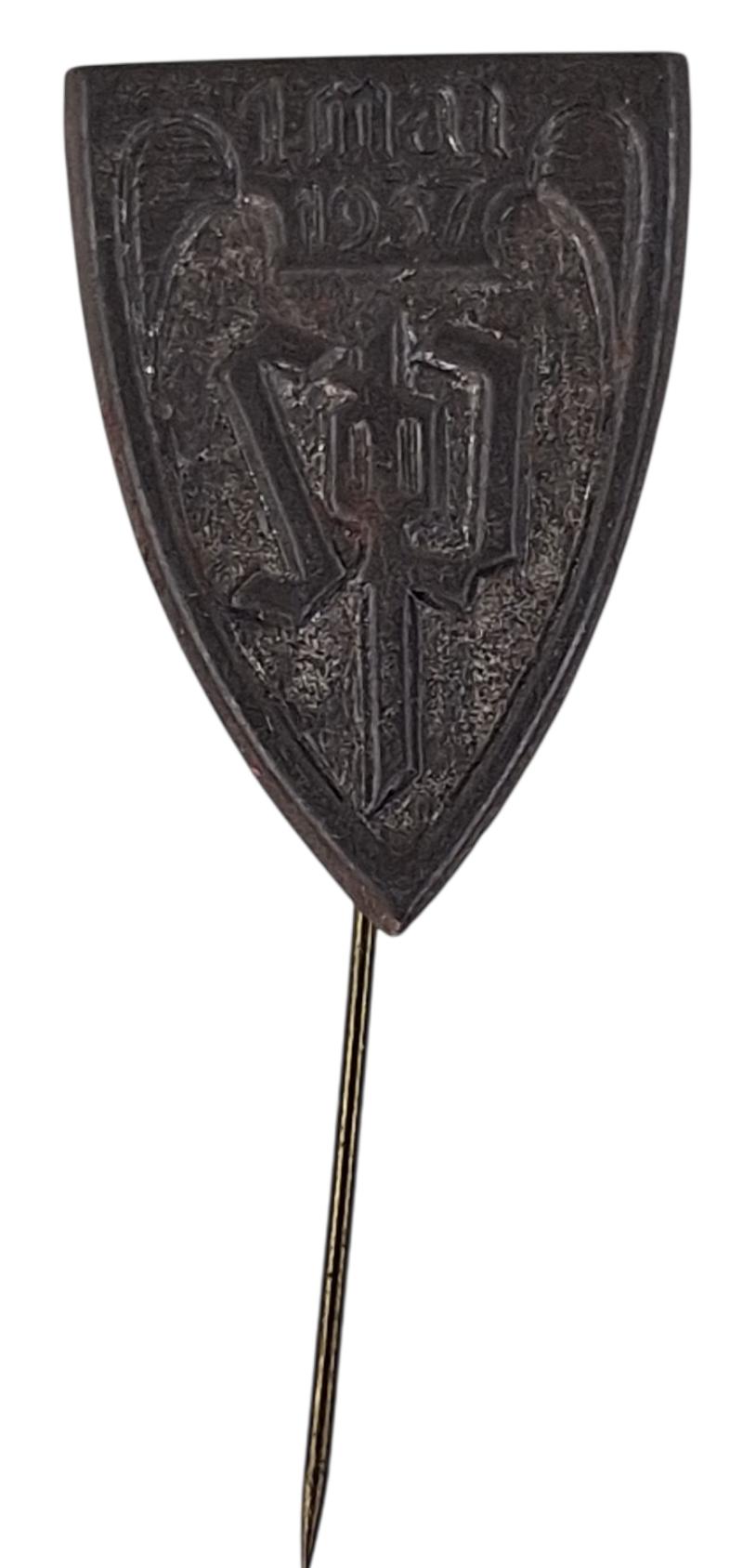 a Press tinnie for Workers Day 1937