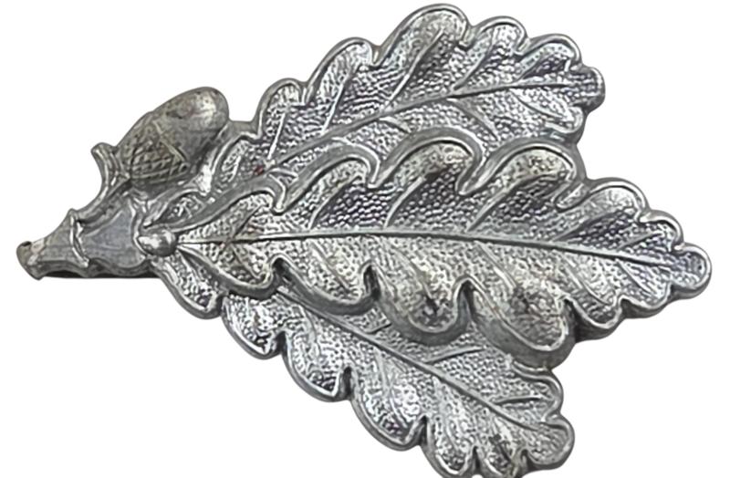 a german ww2 jager metal cap badge